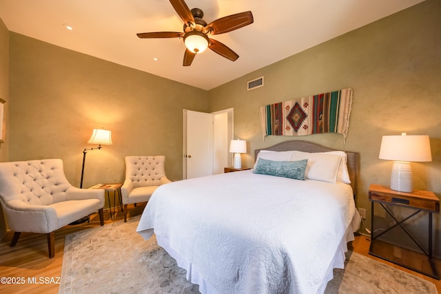 1912 E Water St, Tucson, AZ 85719 - bedroom with wood finished floors and ceiling fan