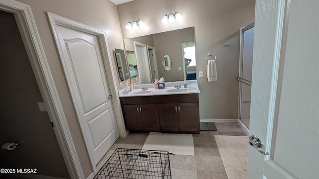 10218 S Hickory Wood Way, Vail, AZ 85641 - full bathroom with double vanity, tile patterned flooring, and a stall shower