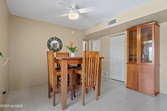 7302 E Rocky Creek Pl, Tucson, AZ 85750 - dining space with ceiling fan and light tile patterned floors