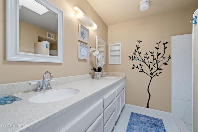 7302 E Rocky Creek Pl, Tucson, AZ 85750 - full bathroom with double vanity and tile patterned floors