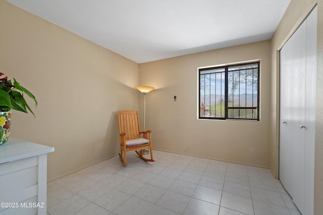 7302 E Rocky Creek Pl, Tucson, AZ 85750 - sitting room featuring baseboards
