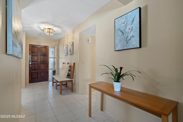 7302 E Rocky Creek Pl, Tucson, AZ 85750 - foyer entrance featuring baseboards and light tile patterned floors