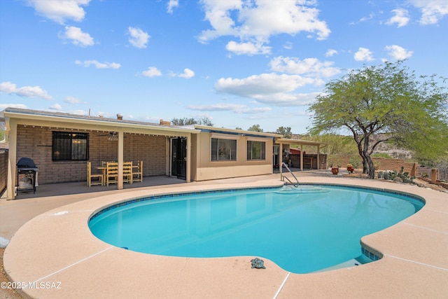 7302 E Rocky Creek Pl, Tucson, AZ 85750 - swimming pool with a patio and area for grilling