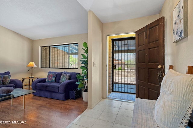 7302 E Rocky Creek Pl, Tucson, AZ 85750 - foyer with light wood-style floors and baseboards