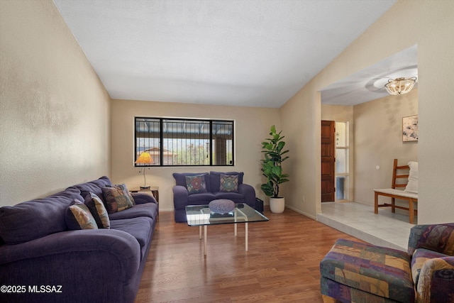 7302 E Rocky Creek Pl, Tucson, AZ 85750 - living area with wood finished floors and lofted ceiling
