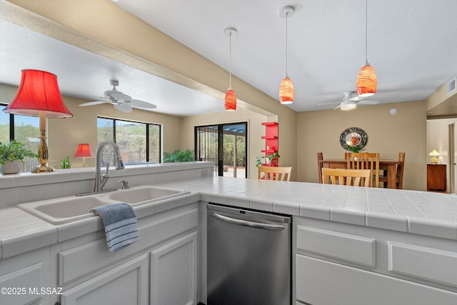 7302 E Rocky Creek Pl, Tucson, AZ 85750 - kitchen featuring dishwasher, ceiling fan, a sink, and tile countertops
