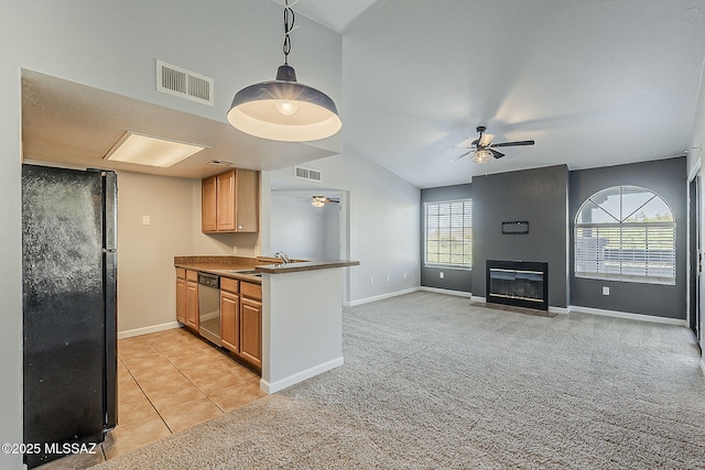 101 S Players Club Dr Unit 11204, Tucson, AZ 85745 - kitchen featuring freestanding refrigerator, a ceiling fan, vaulted ceiling, stainless steel dishwasher, and a sink