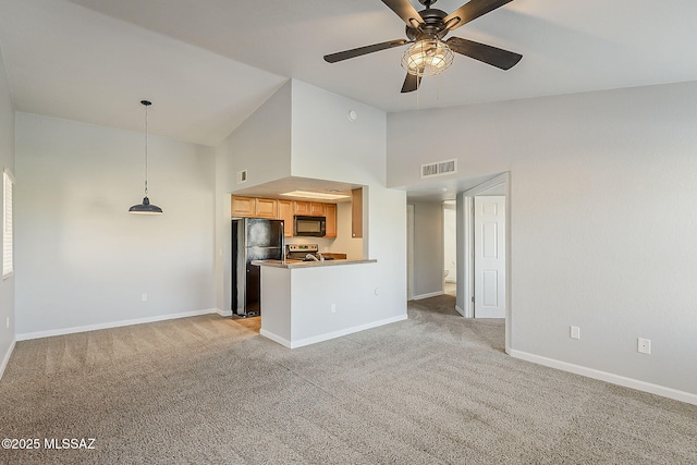 101 S Players Club Dr Unit 11204, Tucson, AZ 85745 - kitchen featuring black appliances, high vaulted ceiling, light colored carpet, baseboards, and ceiling fan