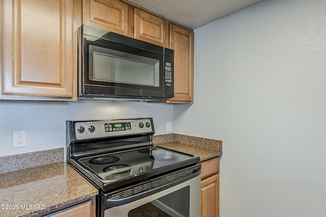 101 S Players Club Dr Unit 11204, Tucson, AZ 85745 - kitchen with electric range, black microwave, and dark countertops