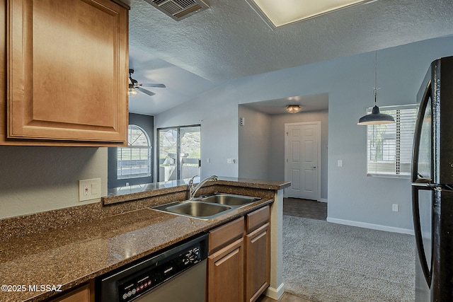 101 S Players Club Dr Unit 11204, Tucson, AZ 85745 - kitchen with dishwasher, a sink, freestanding refrigerator, dark countertops, and lofted ceiling