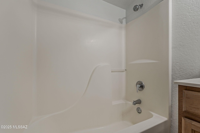 101 S Players Club Dr Unit 11204, Tucson, AZ 85745 - full bathroom with washtub / shower combination and vanity