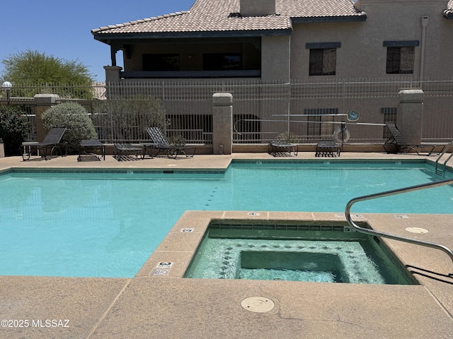 101 S Players Club Dr Unit 11204, Tucson, AZ 85745 - community pool with a community hot tub and a patio