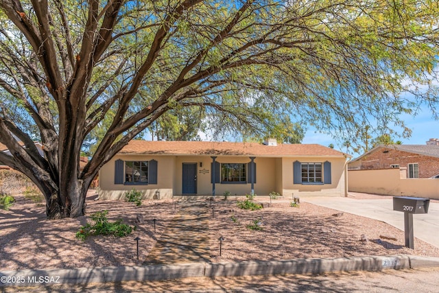 2917 E Malvern St, Tucson, AZ 85716 - ranch-style house featuring stucco siding and a chimney