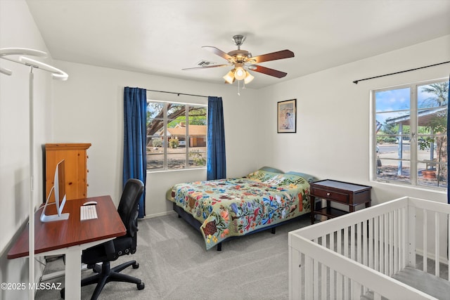 2917 E Malvern St, Tucson, AZ 85716 - carpeted bedroom with a desk, baseboards, and a ceiling fan