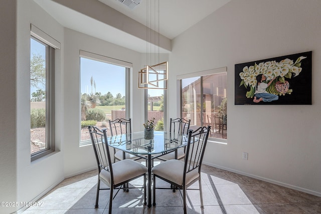 2136 E Desert Fox Dr, Green Valley, AZ 85614 - dining room with baseboards and light tile patterned flooring