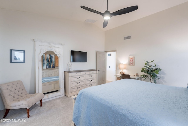 2136 E Desert Fox Dr, Green Valley, AZ 85614 - bedroom featuring light carpet, ceiling fan, and high vaulted ceiling