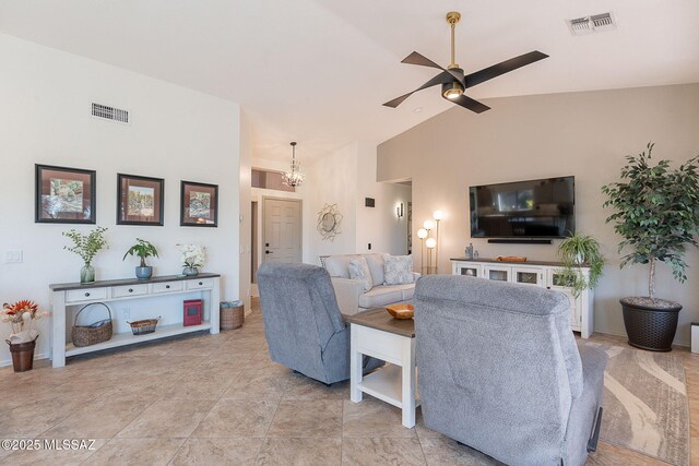 2136 E Desert Fox Dr, Green Valley, AZ 85614 - living area featuring a ceiling fan, a chandelier, baseboards, and high vaulted ceiling