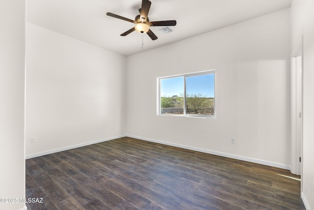 1801 Saltillo Ct, Rio Rico, AZ 85648 - empty room with dark wood-type flooring, ceiling fan, and baseboards