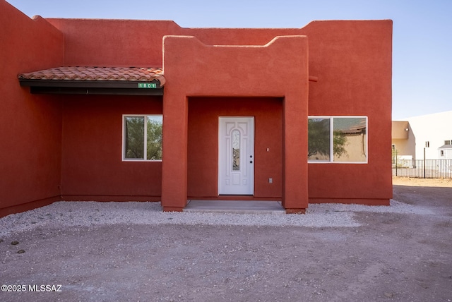 1801 Saltillo Ct, Rio Rico, AZ 85648 - view of front facade with stucco siding and a tiled roof