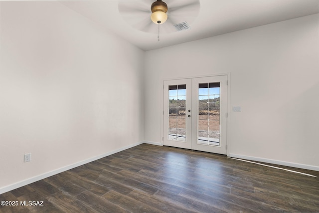1801 Saltillo Ct, Rio Rico, AZ 85648 - empty room with french doors, dark wood-style floors, and baseboards