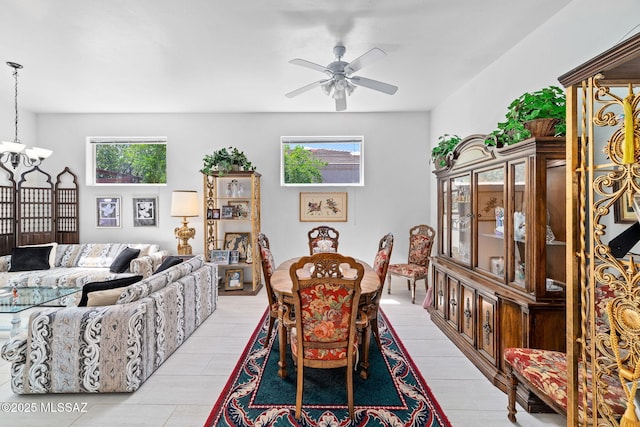 7466 E Placita Del Misterio, Tucson, AZ 85715 - dining room featuring a chandelier and ceiling fan