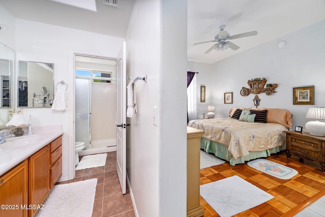 7466 E Placita Del Misterio, Tucson, AZ 85715 - bedroom with a sink, connected bathroom, and ceiling fan