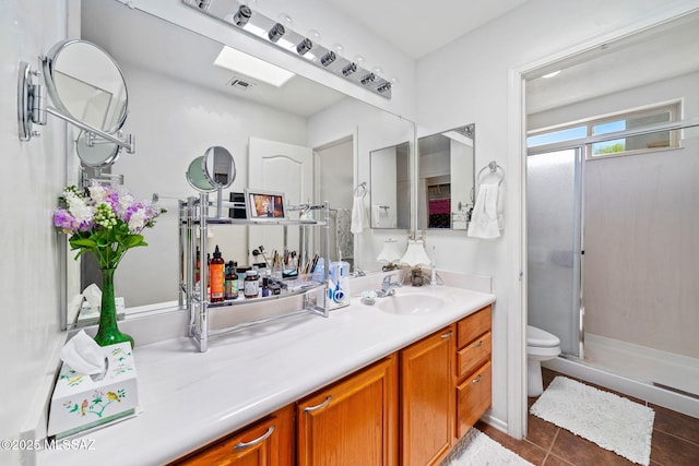 7466 E Placita Del Misterio, Tucson, AZ 85715 - full bath with toilet, a stall shower, vanity, and tile patterned floors