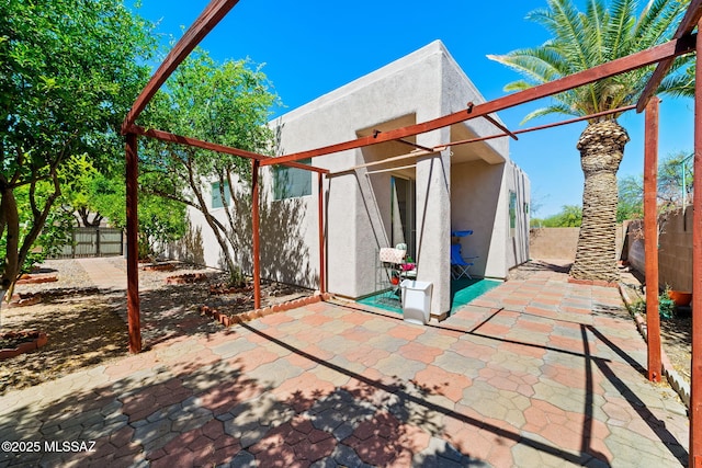 7466 E Placita Del Misterio, Tucson, AZ 85715 - fenced backyard featuring a patio