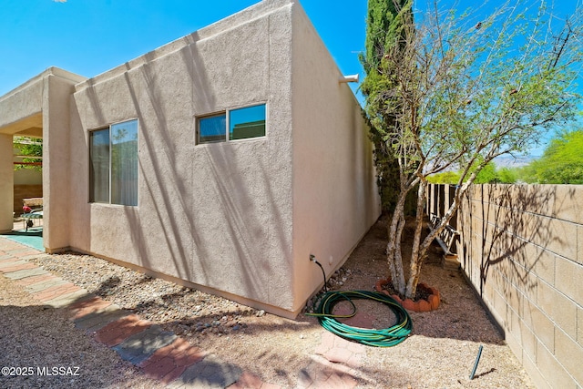 7466 E Placita Del Misterio, Tucson, AZ 85715 - view of side of property featuring stucco siding