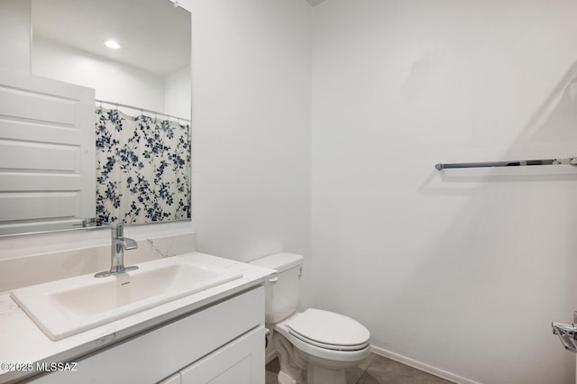 3579 N Kellen Canyon Ct, Tucson, AZ 85745 - full bathroom featuring vanity, toilet, tile patterned flooring, and baseboards