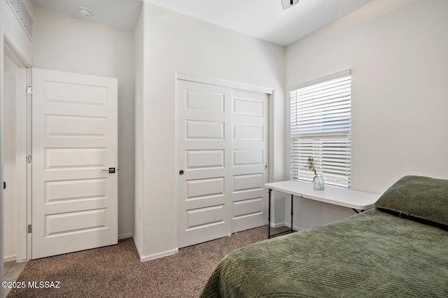 3579 N Kellen Canyon Ct, Tucson, AZ 85745 - bedroom featuring carpet flooring, a closet, and baseboards