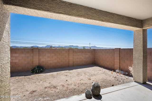 3579 N Kellen Canyon Ct, Tucson, AZ 85745 - fenced backyard with a patio area and a mountain view