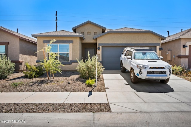 3579 N Kellen Canyon Ct, Tucson, AZ 85745 - view of front of property with driveway, an attached garage, and stucco siding