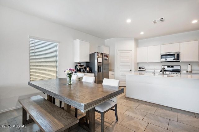3579 N Kellen Canyon Ct, Tucson, AZ 85745 - dining space with recessed lighting and light tile patterned flooring