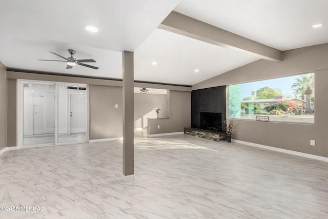 5541 E Mabel St, Tucson, AZ 85712 - unfurnished living room with ceiling fan, a fireplace, light marble finish floors, and recessed lighting