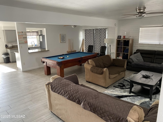 3533 N Palmer Dr, Tucson, AZ 85716 - game room featuring billiards, a sink, a ceiling fan, baseboards, and light wood-style flooring