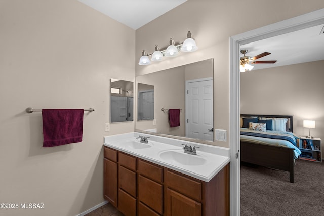 77 N Mail Station Ln, Sahuarita, AZ 85629 - full bath with double vanity, ensuite bathroom, and ceiling fan