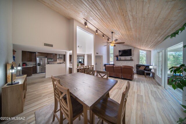 5617 N Camino Del Conde, Tucson, AZ 85718 - dining room with wooden ceiling, track lighting, light wood-style flooring, a ceiling fan, and high vaulted ceiling