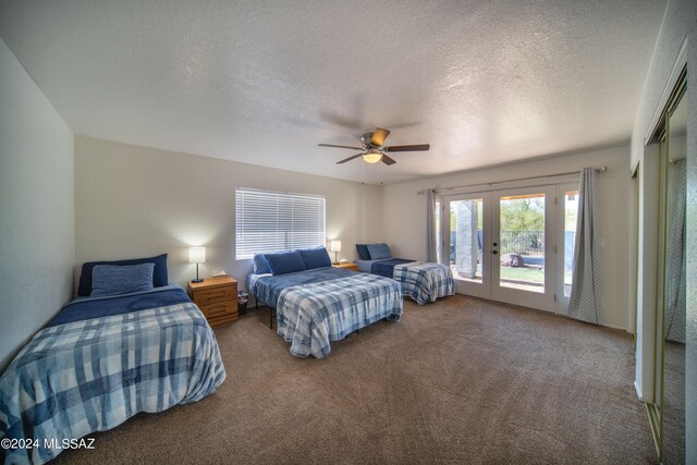 5617 N Camino Del Conde, Tucson, AZ 85718 - carpeted bedroom featuring french doors, access to exterior, a textured ceiling, and ceiling fan