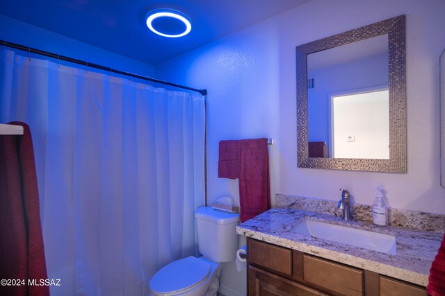 5617 N Camino Del Conde, Tucson, AZ 85718 - full bath with toilet, vanity, and curtained shower