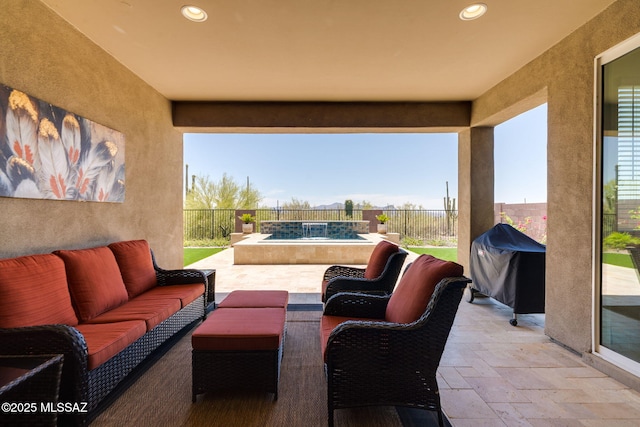 7823 W Buckeye Path, Marana, AZ 85658 - fenced backyard featuring outdoor lounge area, a patio, and area for grilling