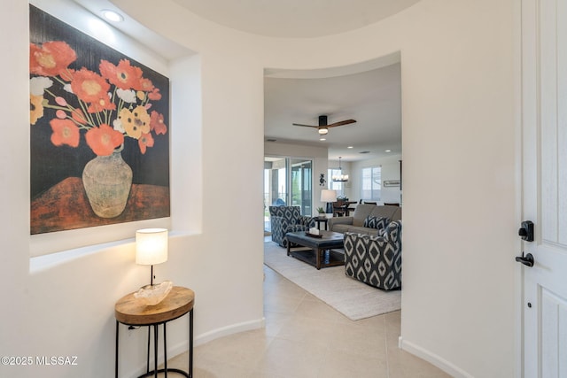 7823 W Buckeye Path, Marana, AZ 85658 - hall with baseboards and tile patterned flooring