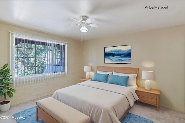 341 W Camino Penasco Apt B, Green Valley, AZ 85614 - bedroom featuring tile patterned floors and a ceiling fan