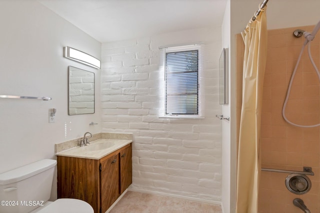 341 W Camino Penasco Apt B, Green Valley, AZ 85614 - full bathroom featuring vanity, toilet, shower / bath combination with curtain, and brick wall