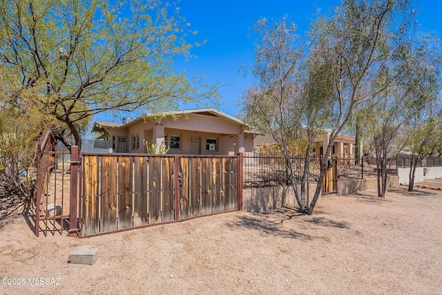 1034 N 7th Ave, Tucson, AZ 85705 - view of front of property with stucco siding