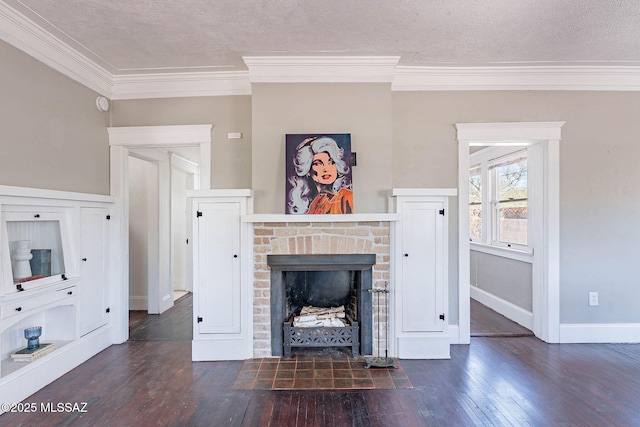 1034 N 7th Ave, Tucson, AZ 85705 - unfurnished living room with dark wood-style flooring, ornamental molding, baseboards, a textured ceiling, and a brick fireplace