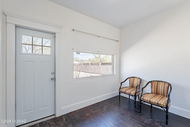 1034 N 7th Ave, Tucson, AZ 85705 - entrance foyer featuring dark wood-style flooring, healthy amount of natural light, and baseboards
