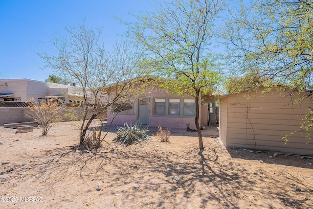 1034 N 7th Ave, Tucson, AZ 85705 - back of property featuring stucco siding