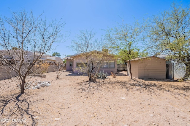1034 N 7th Ave, Tucson, AZ 85705 - rear view of property featuring stucco siding