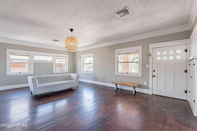 1034 N 7th Ave, Tucson, AZ 85705 - entryway featuring dark wood-type flooring, a textured ceiling, ornamental molding, and baseboards
